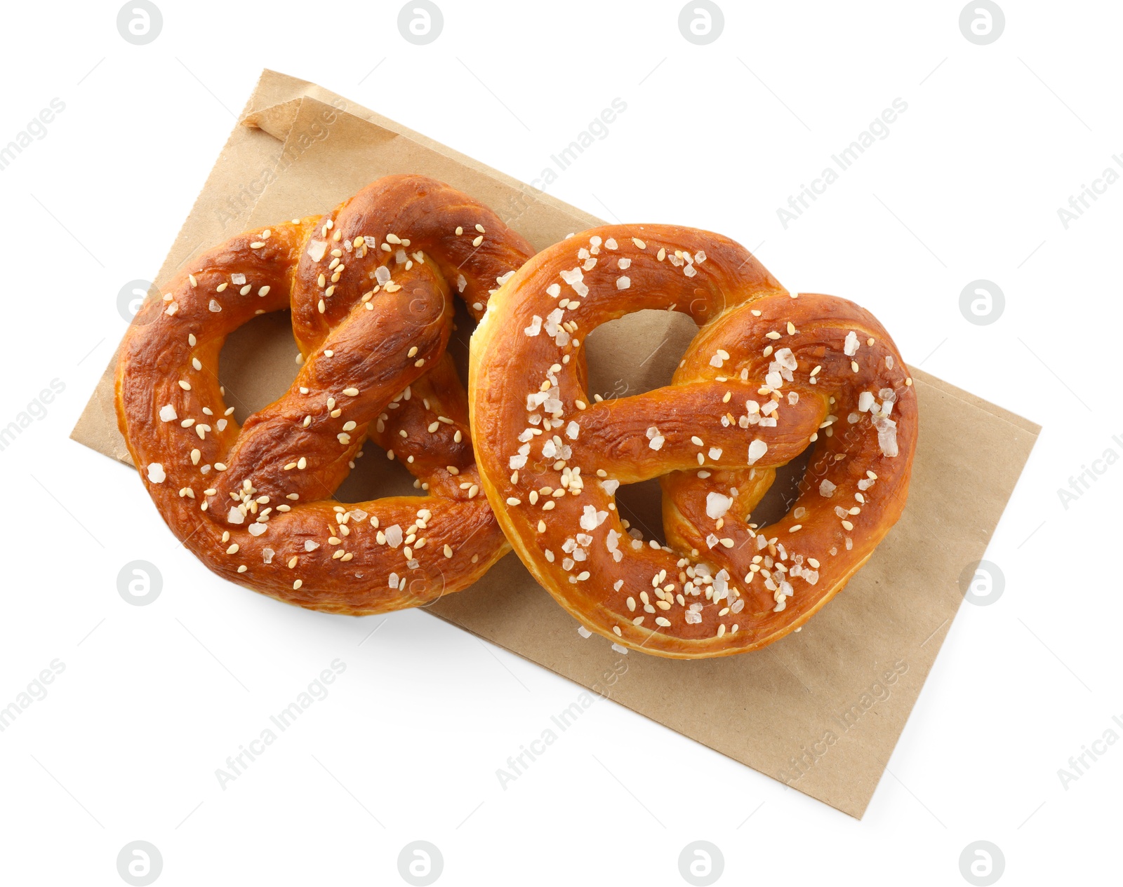 Tasty pretzels with salt isolated on white, top view Photo of Tasty pretzels with salt isolated on white, top view