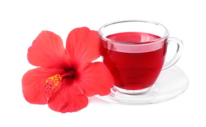 Photo of Delicious hibiscus tea in glass cup and beautiful flower isolated on white