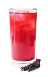 Photo of Delicious hibiscus tea with ice cubes in glass and dry roselle sepals isolated on white