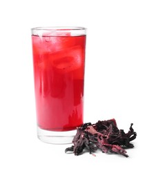 Photo of Delicious hibiscus tea with ice cubes in glass and dry roselle sepals isolated on white