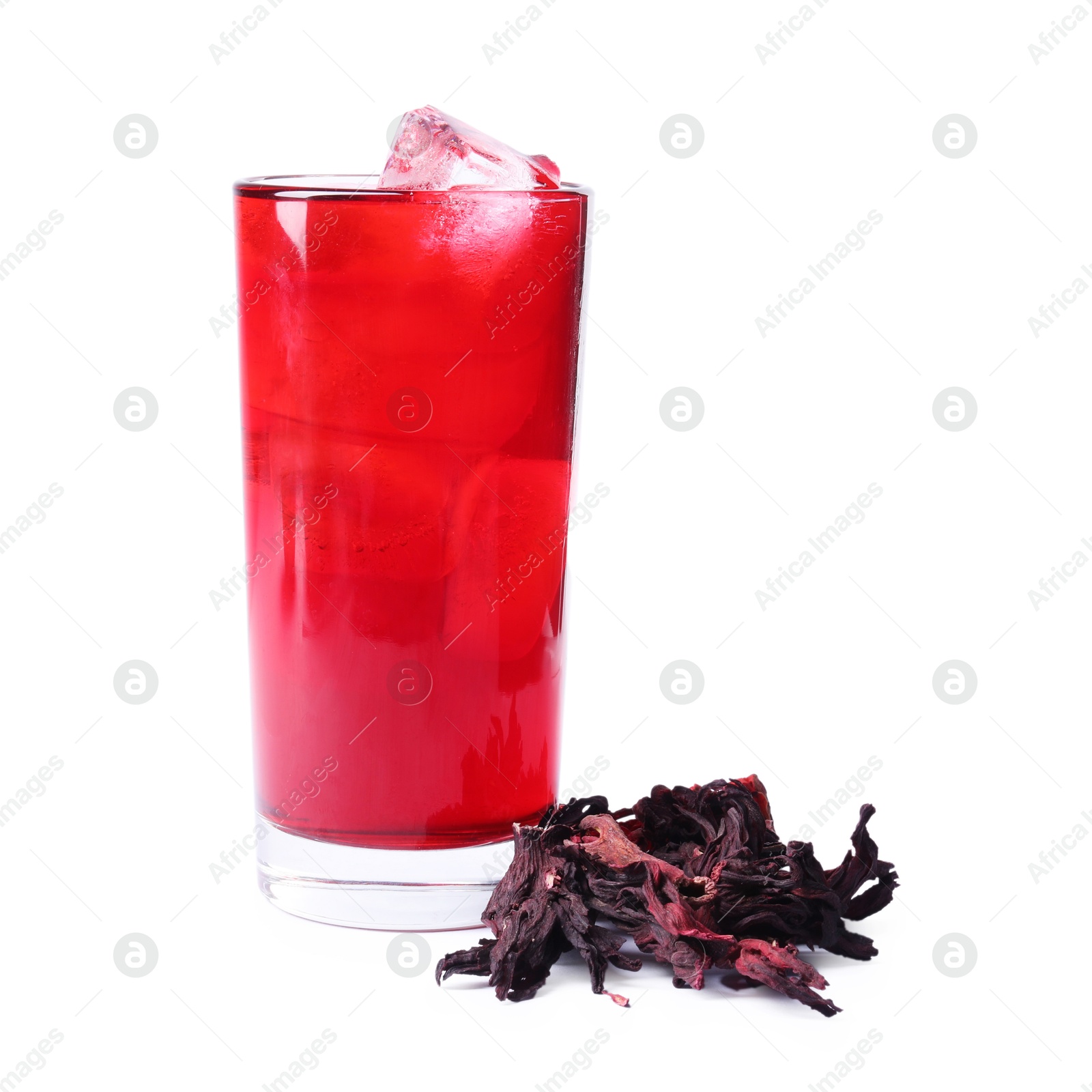 Delicious hibiscus tea with ice cubes in glass and dry roselle sepals isolated on white Photo of Delicious hibiscus tea with ice cubes in glass and dry roselle sepals isolated on white
