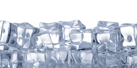 Photo of Cubes of clear ice on white background