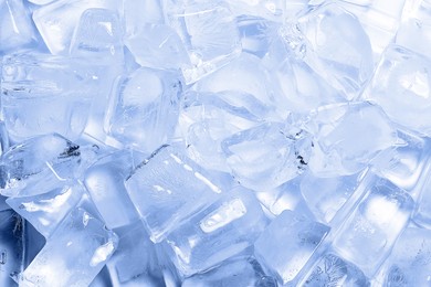 Photo of Cubes of clear ice as background, closeup