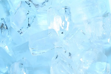 Photo of Cubes of clear ice as background, closeup