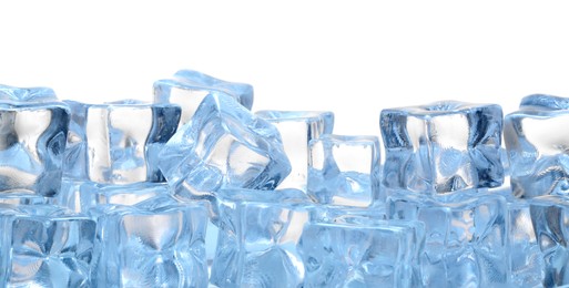 Photo of Cubes of clear ice on white background