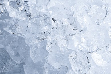 Photo of Cubes of clear ice as background, closeup