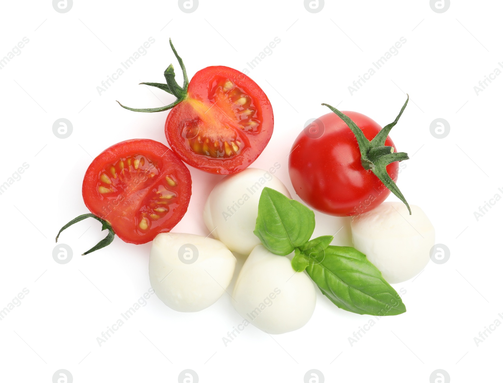 Tasty mozzarella cheese balls, tomatoes and basil isolated on white, top view Photo of Tasty mozzarella cheese balls, tomatoes and basil isolated on white, top view