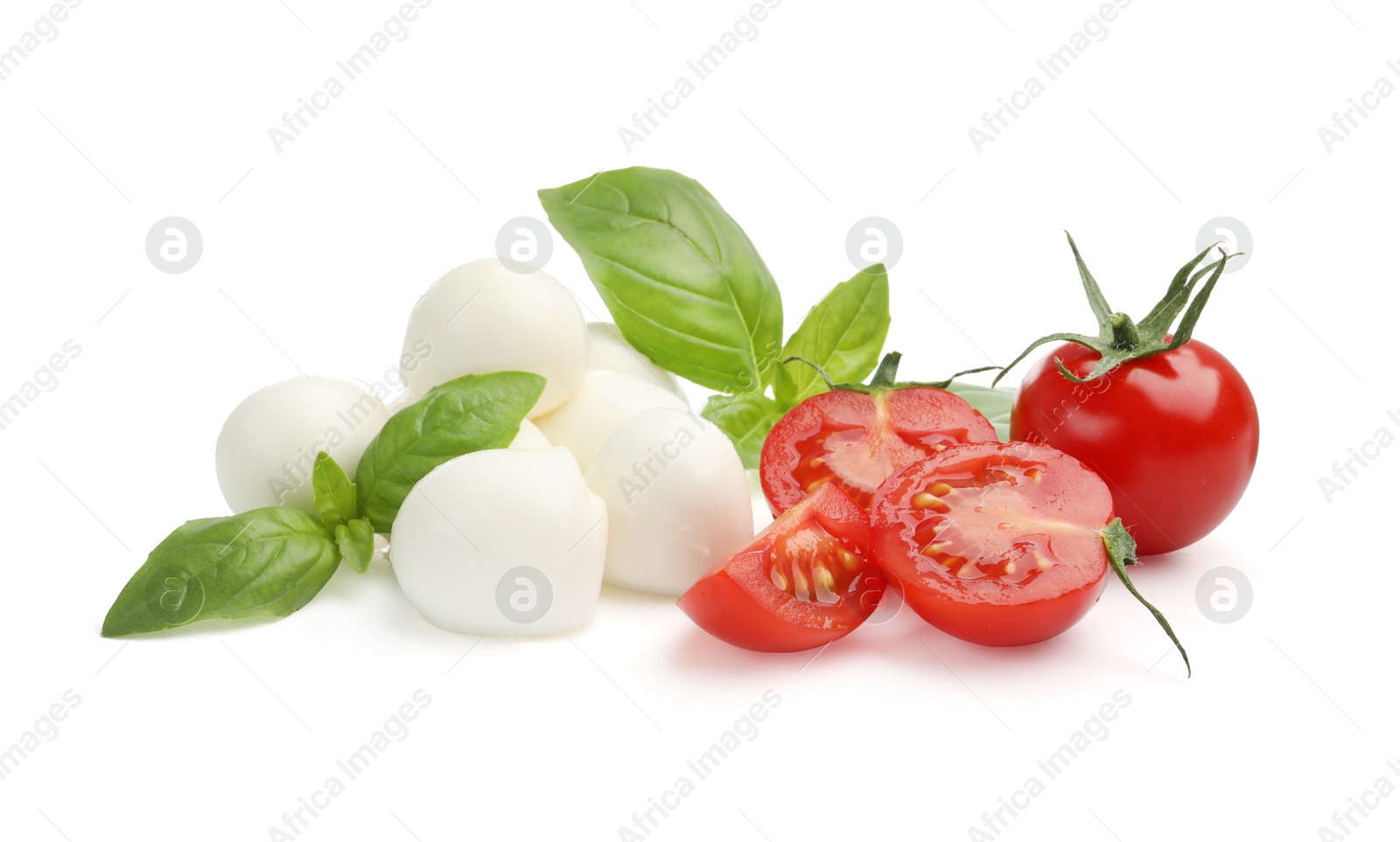 Tasty mozzarella cheese balls, tomatoes and basil isolated on white Photo of Tasty mozzarella cheese balls, tomatoes and basil isolated on white
