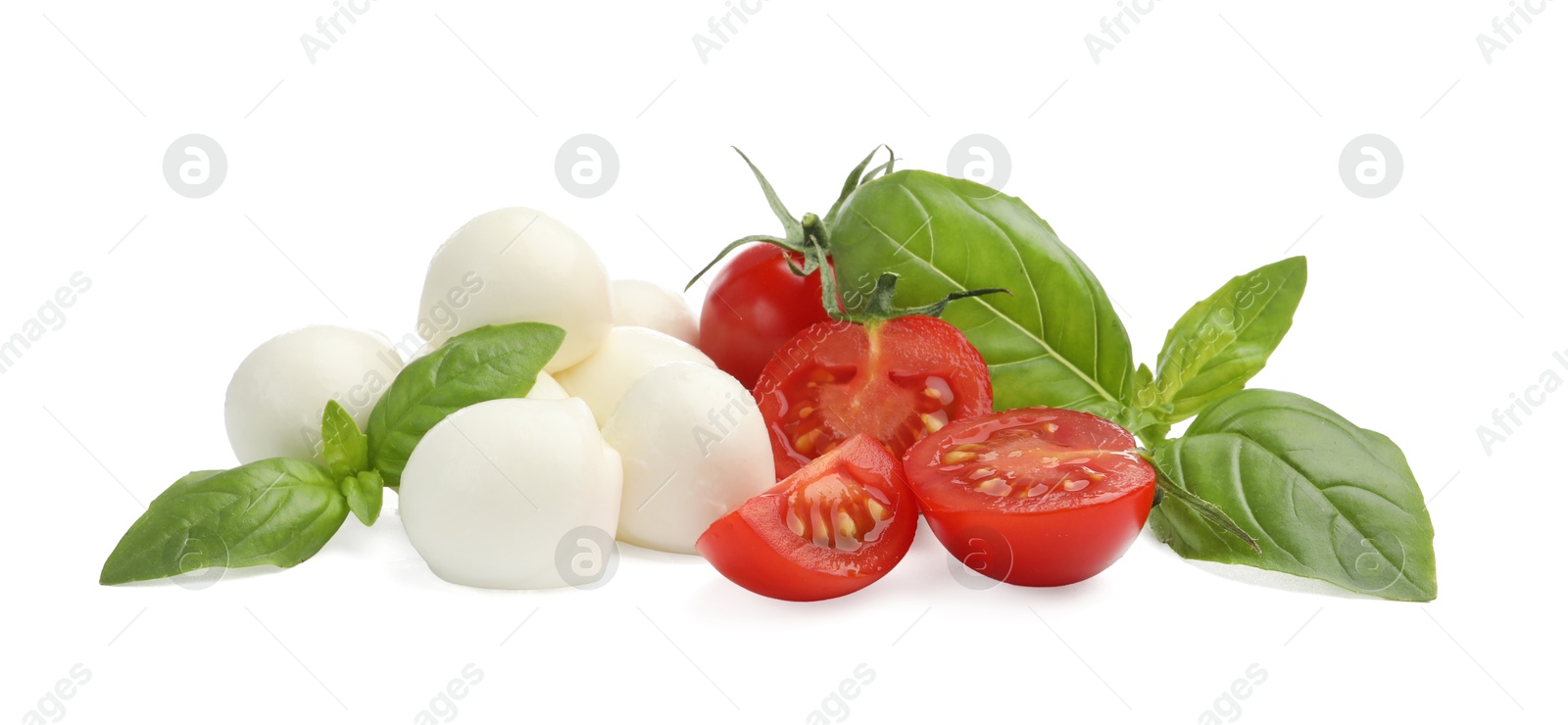 Tasty mozzarella cheese balls, tomatoes and basil isolated on white Photo of Tasty mozzarella cheese balls, tomatoes and basil isolated on white