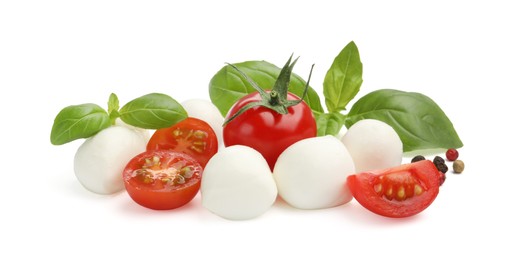 Photo of Tasty mozzarella cheese balls, tomatoes, peppercorns and basil isolated on white