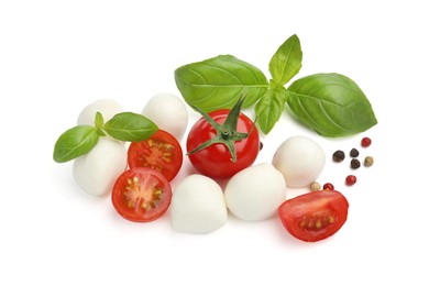 Photo of Tasty mozzarella cheese balls, tomatoes, peppercorns and basil isolated on white, top view