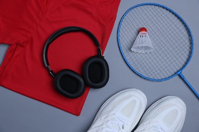 Photo of Flat lay composition with sportswear on grey background