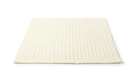 Photo of Clean beige waffle towel isolated on white