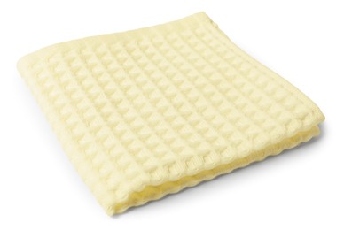 Photo of Clean yellow waffle towel isolated on white
