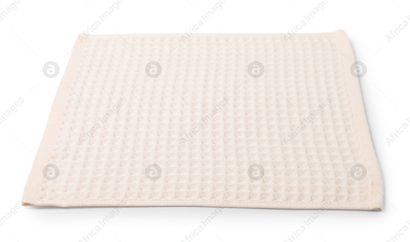 Clean beige waffle towel isolated on white Photo of Clean beige waffle towel isolated on white