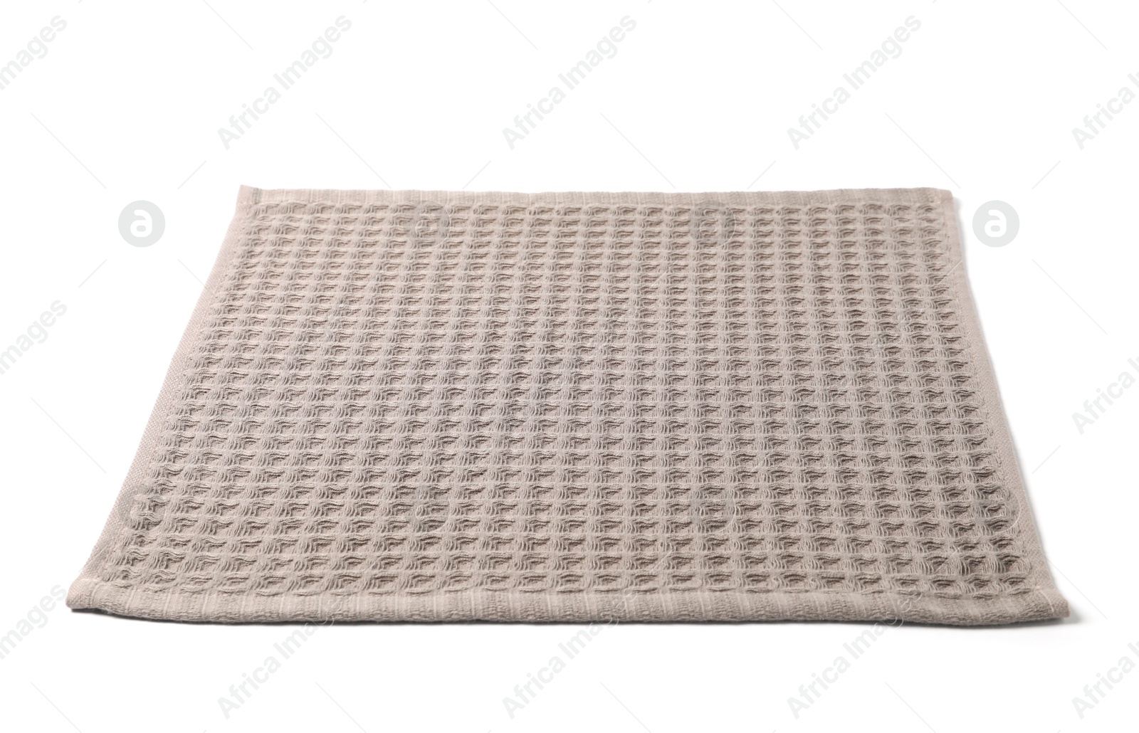 Clean brown waffle towel isolated on white Photo of Clean brown waffle towel isolated on white