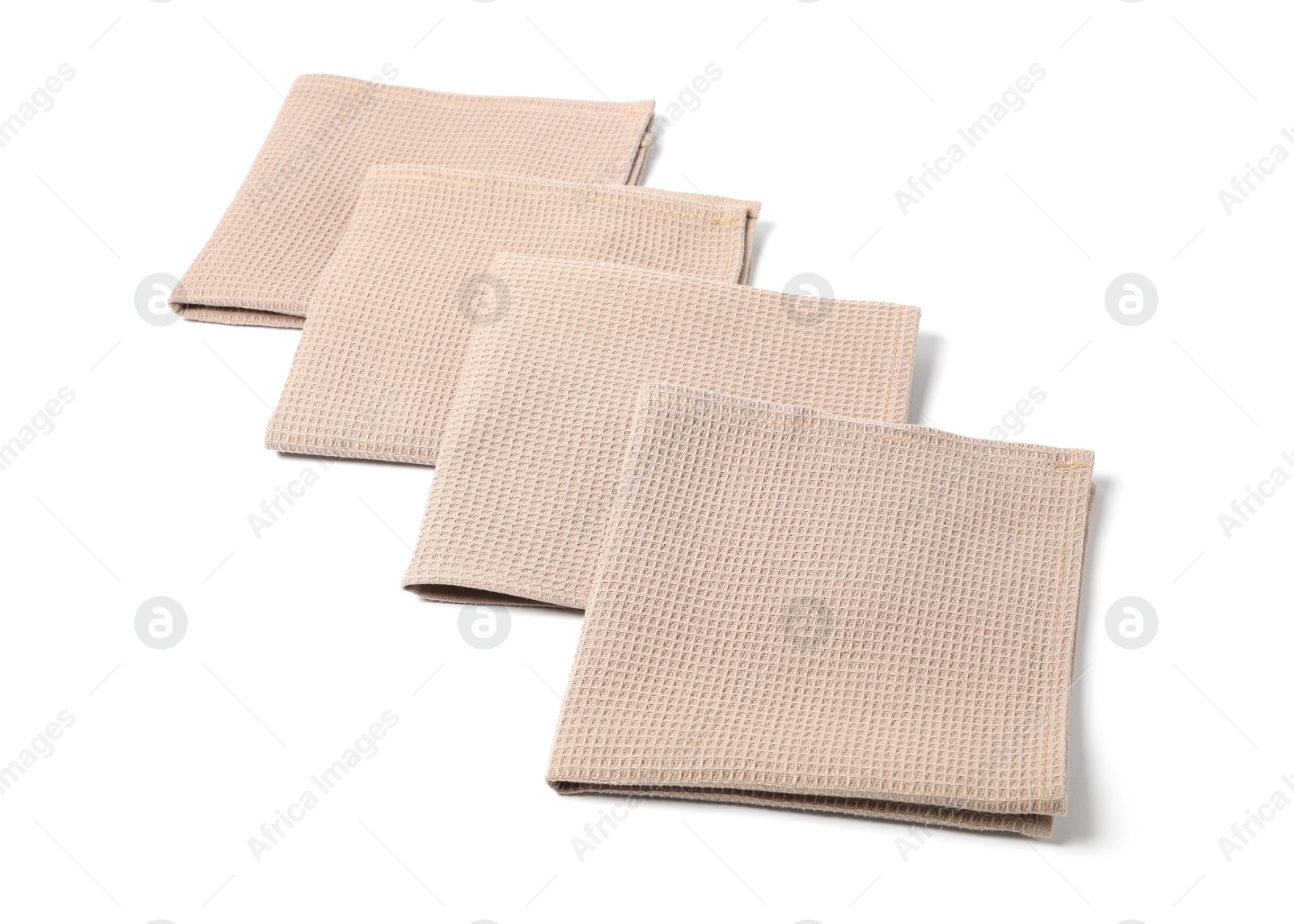 Many clean waffle towels isolated on white Photo of Many clean waffle towels isolated on white