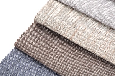Photo of Samples of different fabrics isolated on white