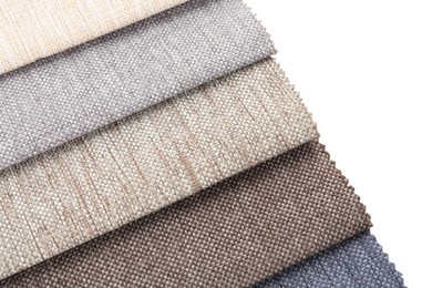 Photo of Samples of different fabrics isolated on white