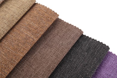 Photo of Samples of different fabrics isolated on white