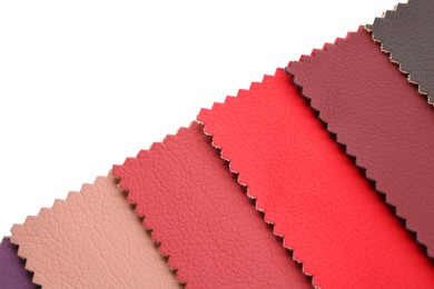 Photo of Samples of different fabrics isolated on white, top view