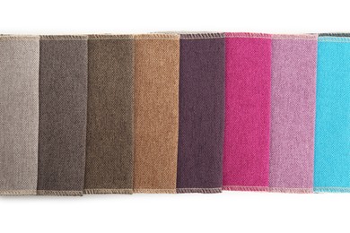 Photo of Samples of different fabrics isolated on white, top view