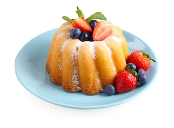 Photo of Tasty Bundt cake with powdered sugar and berries isolated on white