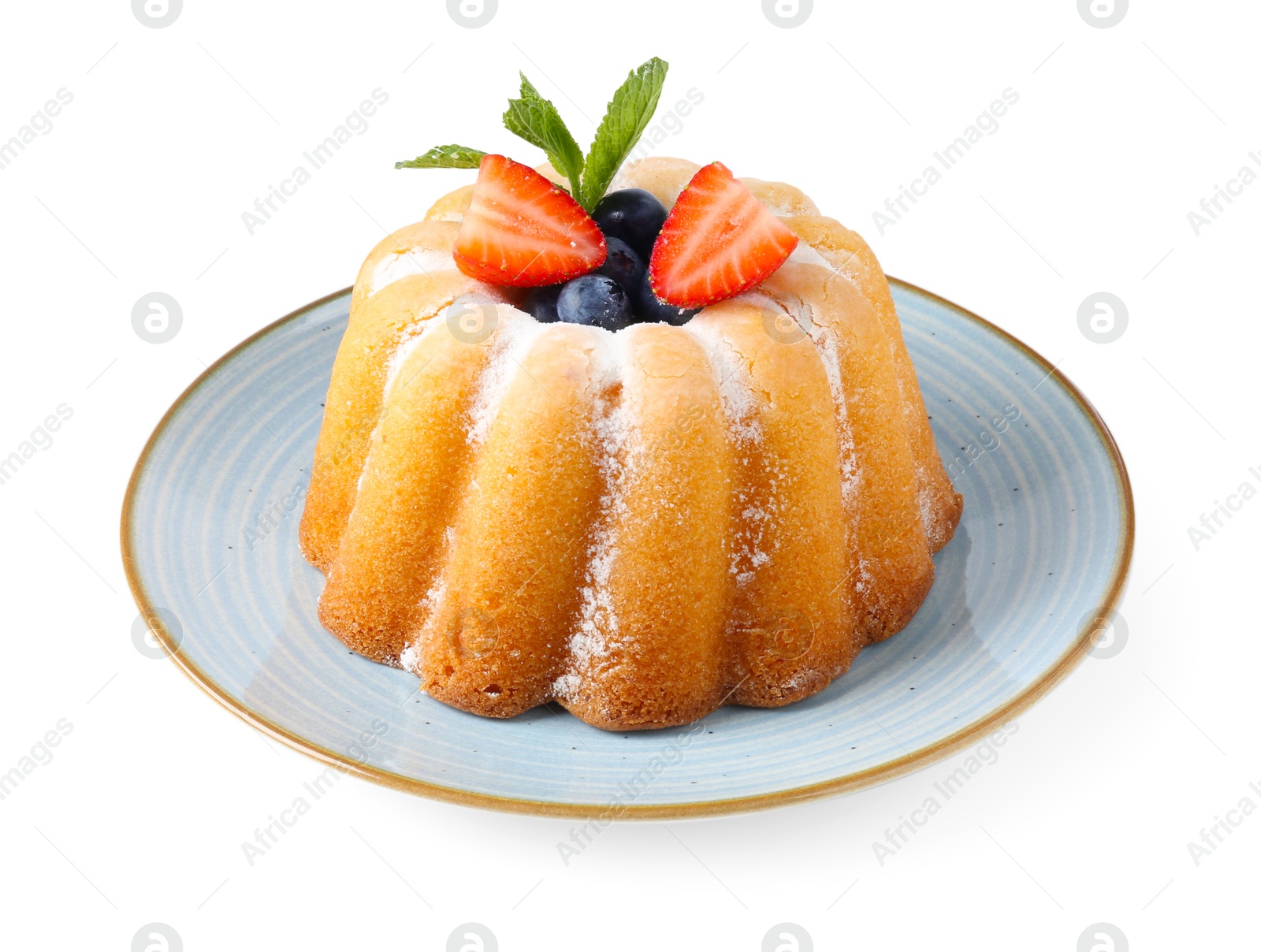 Tasty Bundt cake with powdered sugar and berries isolated on white Photo of Tasty Bundt cake with powdered sugar and berries isolated on white