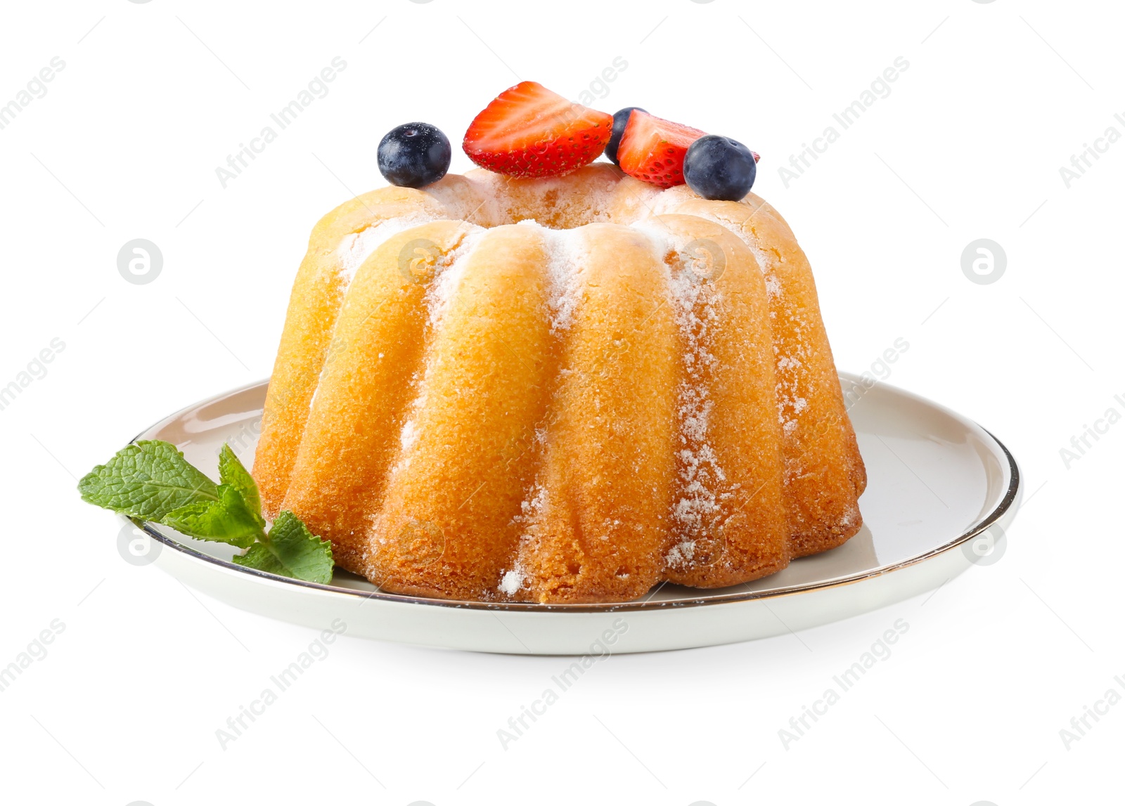 Tasty Bundt cake with powdered sugar and berries isolated on white Photo of Tasty Bundt cake with powdered sugar and berries isolated on white