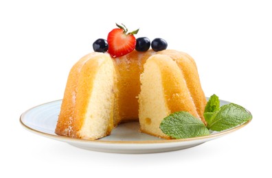 Photo of Tasty bundt cake with powdered sugar, berries and mint isolated on white