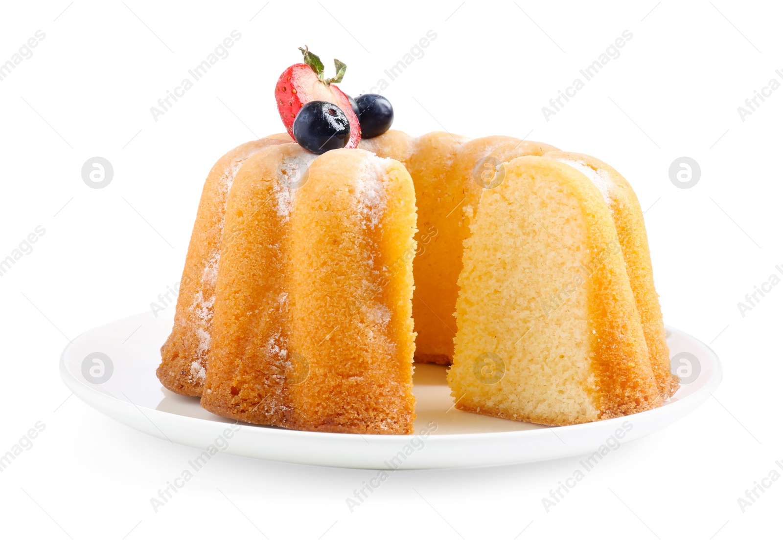 Tasty bundt cake with powdered sugar and berries isolated on white Photo of Tasty bundt cake with powdered sugar and berries isolated on white