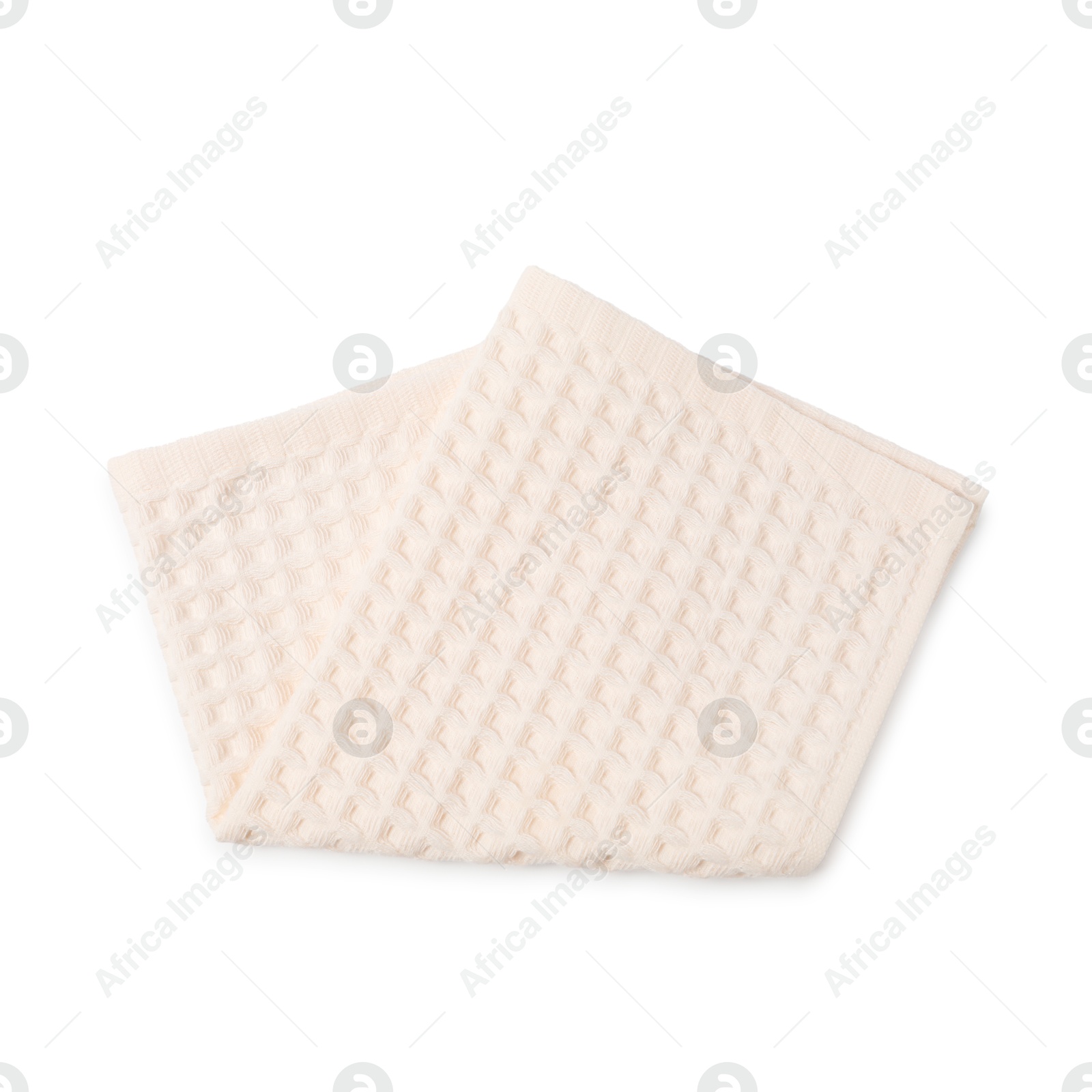 Clean beige waffle towel isolated on white, top view Photo of Clean beige waffle towel isolated on white, top view