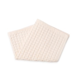 Photo of Clean beige waffle towel isolated on white, top view