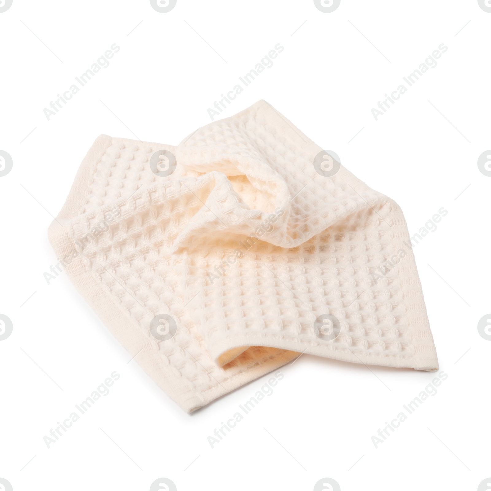 Clean beige waffle towel isolated on white Photo of Clean beige waffle towel isolated on white