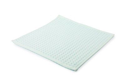 Photo of Clean light turquoise waffle towel isolated on white