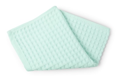 Photo of Clean light turquoise waffle towel isolated on white, top view