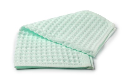 Photo of Clean light turquoise waffle towel isolated on white