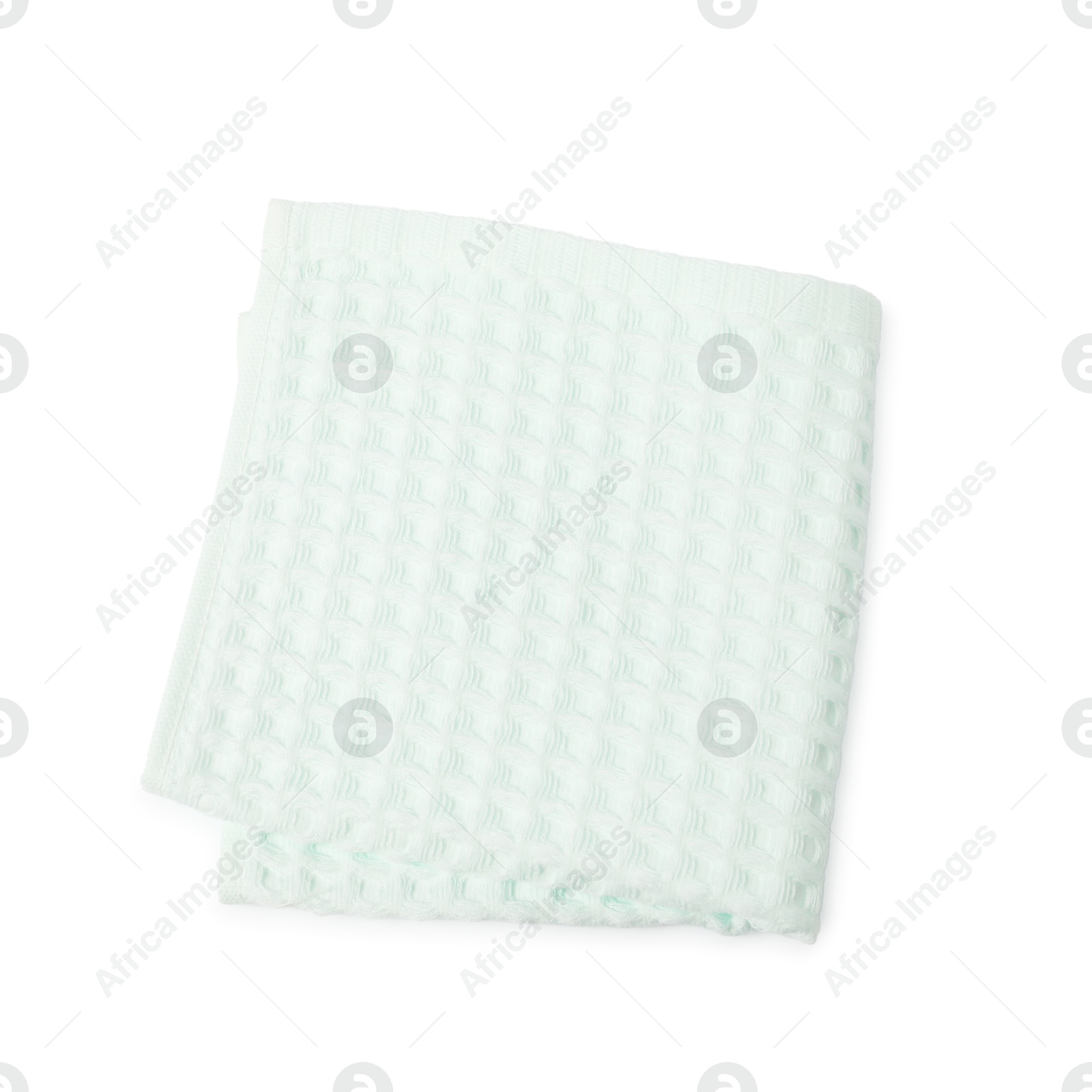 Clean light turquoise waffle towel isolated on white, top view Photo of Clean light turquoise waffle towel isolated on white, top view