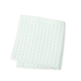 Photo of Clean light turquoise waffle towel isolated on white, top view