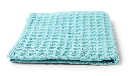 Photo of Clean light blue waffle towel isolated on white