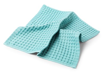 Photo of Clean light blue waffle towel isolated on white