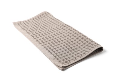 Photo of Clean brown waffle towel isolated on white