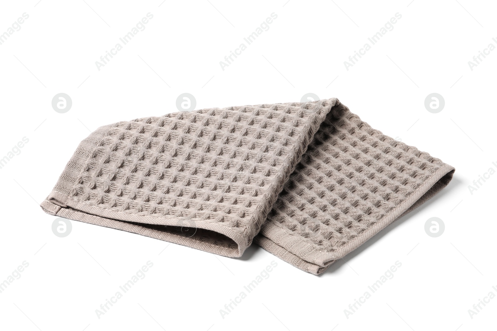 Clean brown waffle towel isolated on white Photo of Clean brown waffle towel isolated on white