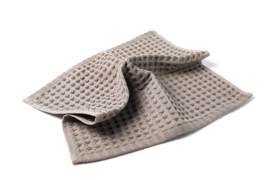 Photo of Clean brown waffle towel isolated on white