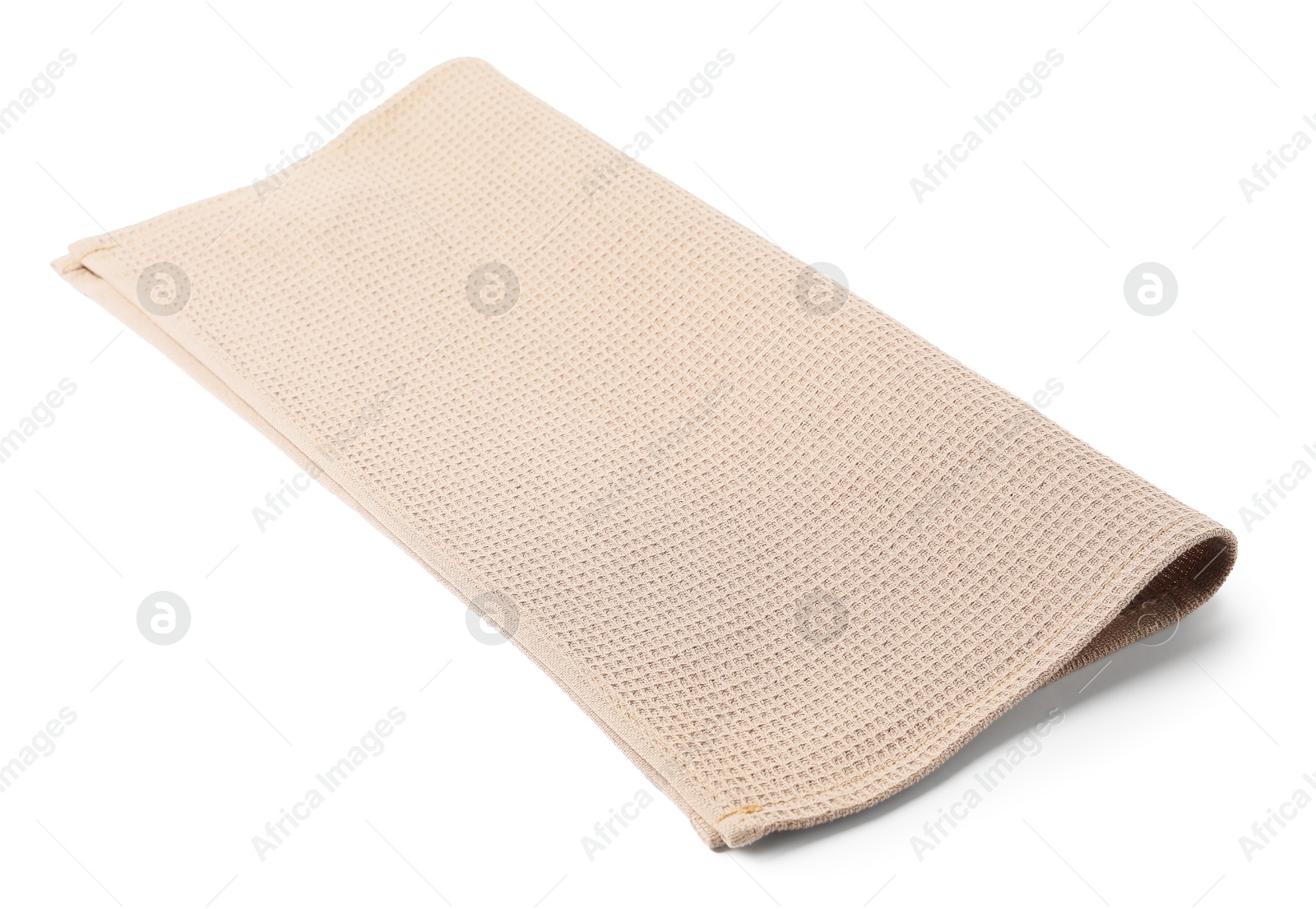 Clean beige waffle towel isolated on white Photo of Clean beige waffle towel isolated on white