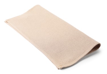 Photo of Clean beige waffle towel isolated on white
