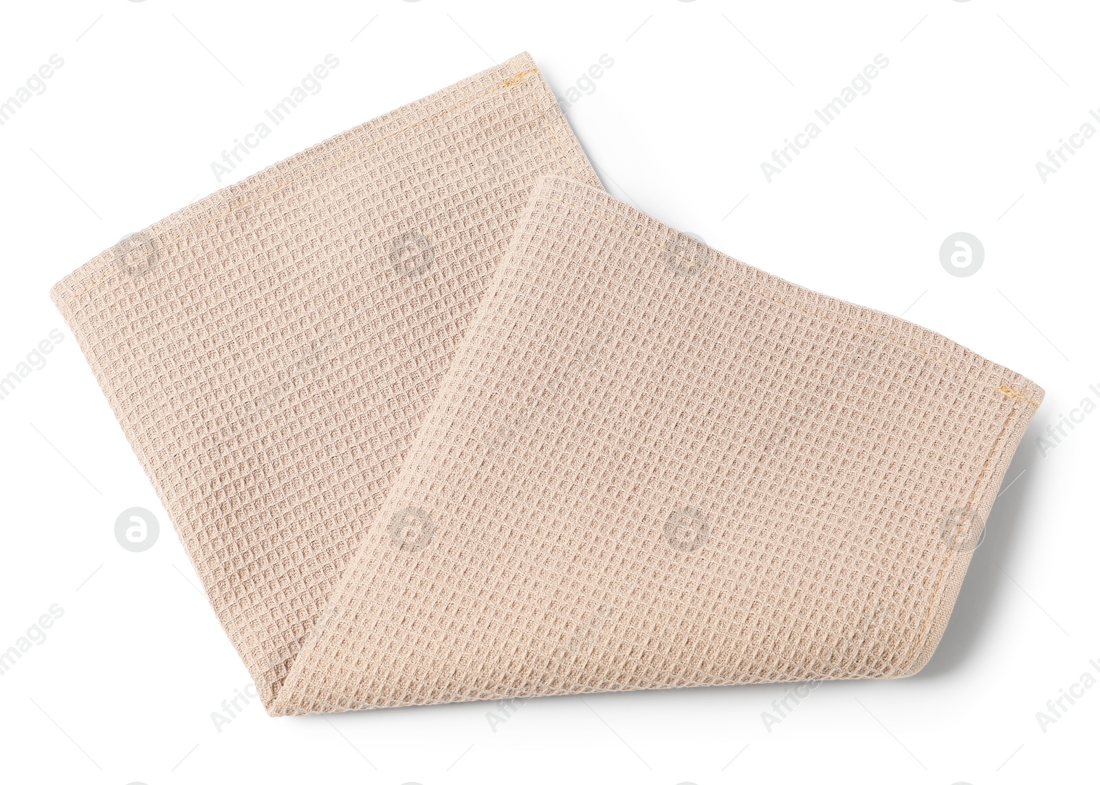 Clean beige waffle towel isolated on white, top view Photo of Clean beige waffle towel isolated on white, top view