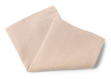 Photo of Clean beige waffle towel isolated on white, top view