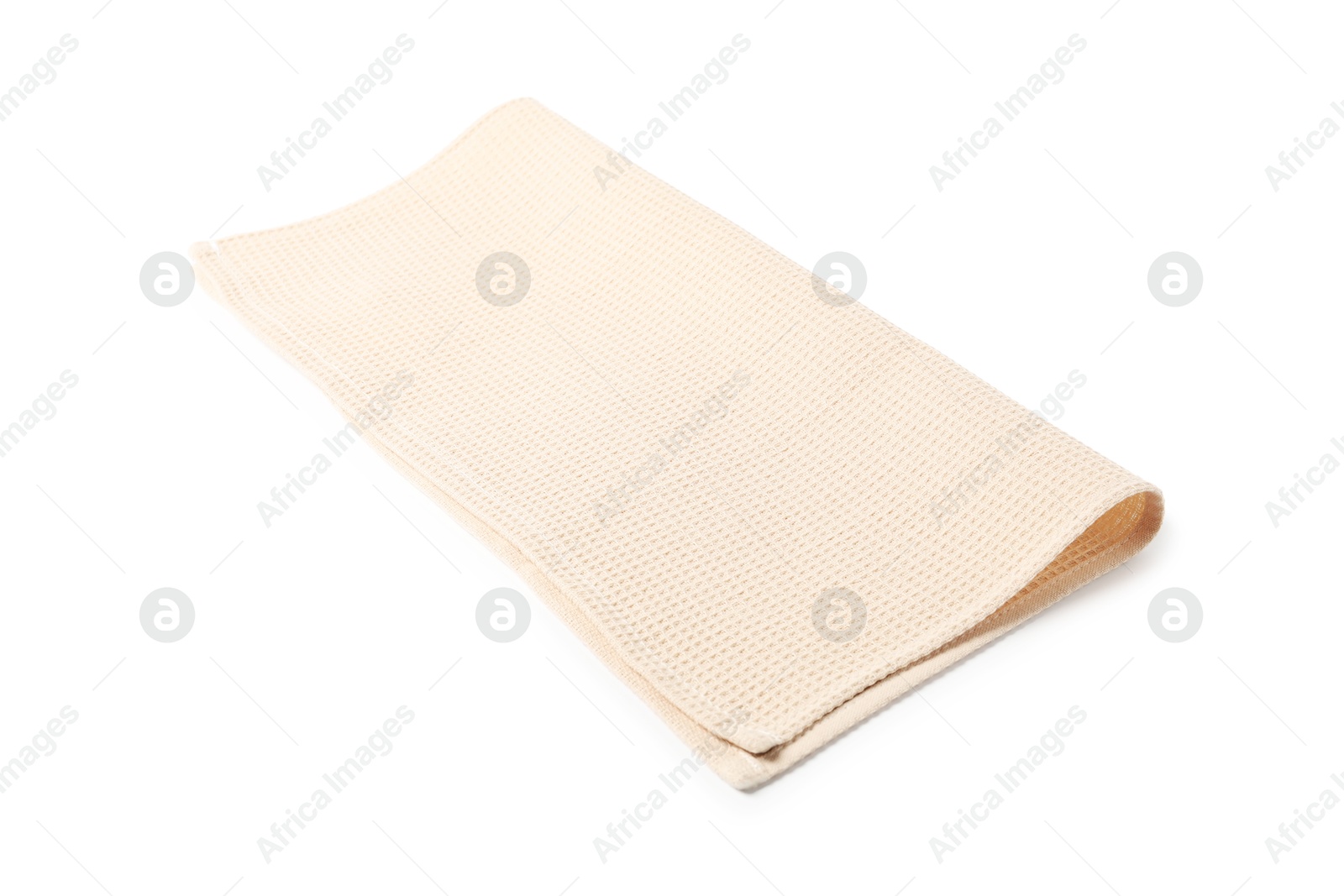 Clean beige waffle towel isolated on white Photo of Clean beige waffle towel isolated on white