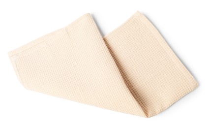 Photo of Clean beige waffle towel isolated on white, top view